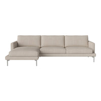 Beige sectional sofa with smooth, textured upholstery and sleek metal legs, perfect for modern living spaces.
