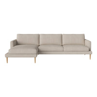 Light beige sectional sofa with a textured fabric and wooden legs, offering a modern and neutral design.