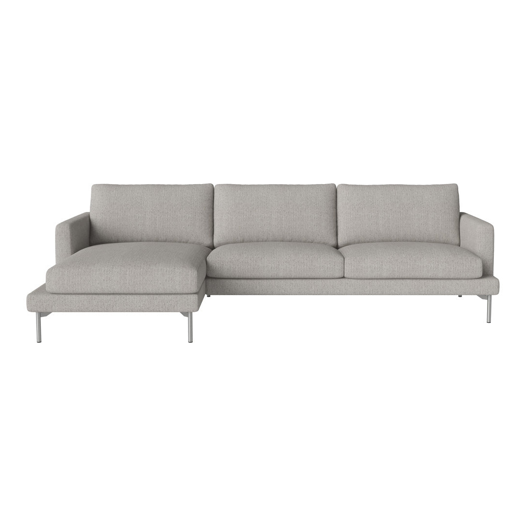 Light gray sectional sofa with smooth upholstery and minimalistic design, featuring clean lines and a contemporary look.