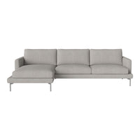 Light gray sectional sofa with smooth upholstery and minimalistic design, featuring clean lines and a contemporary look.