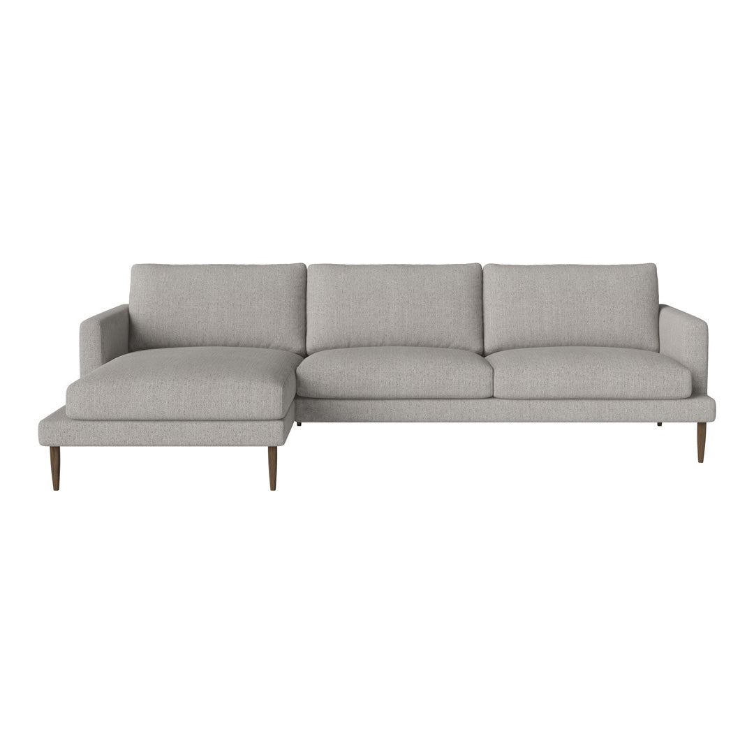 Light gray sectional sofa with sleek lines and smooth upholstery, featuring a minimalist design and subtle texture.