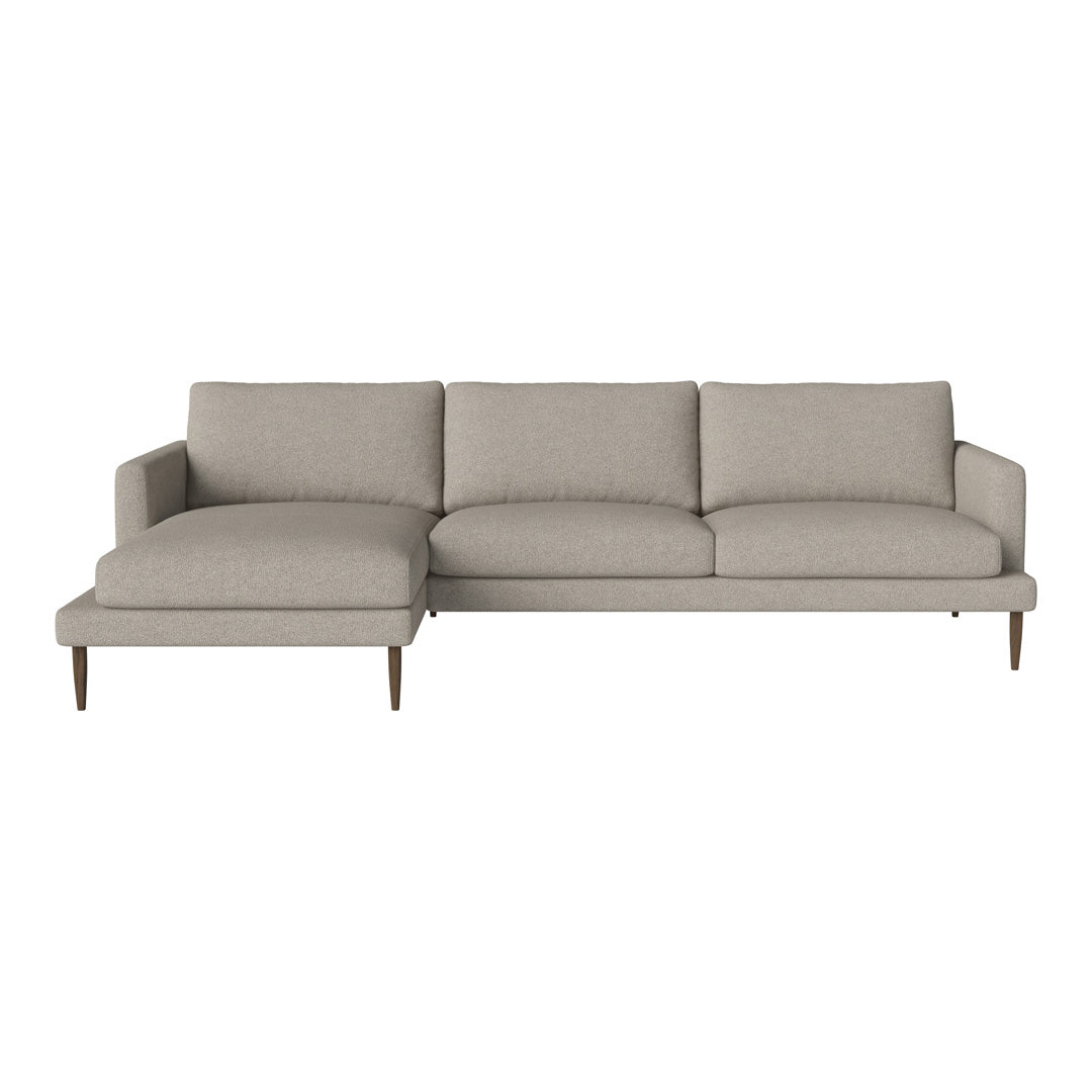 Light beige sectional sofa with smooth, textured fabric and minimalist design. Ideal for modern living spaces.