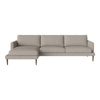Light beige sectional sofa with smooth, textured fabric and minimalist design. Ideal for modern living spaces.