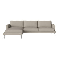 Light beige modern sectional sofa with clean lines and soft, textured upholstery; minimalist design complements any decor.