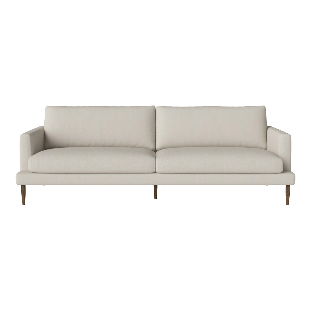 Light beige sofa with a minimalist design and smooth fabric, featuring subtle texture and wooden legs for a modern touch.