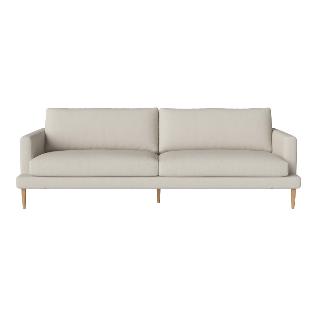 Light beige sofa with a simple, modern design and smooth fabric, featuring straight lines and wooden legs.