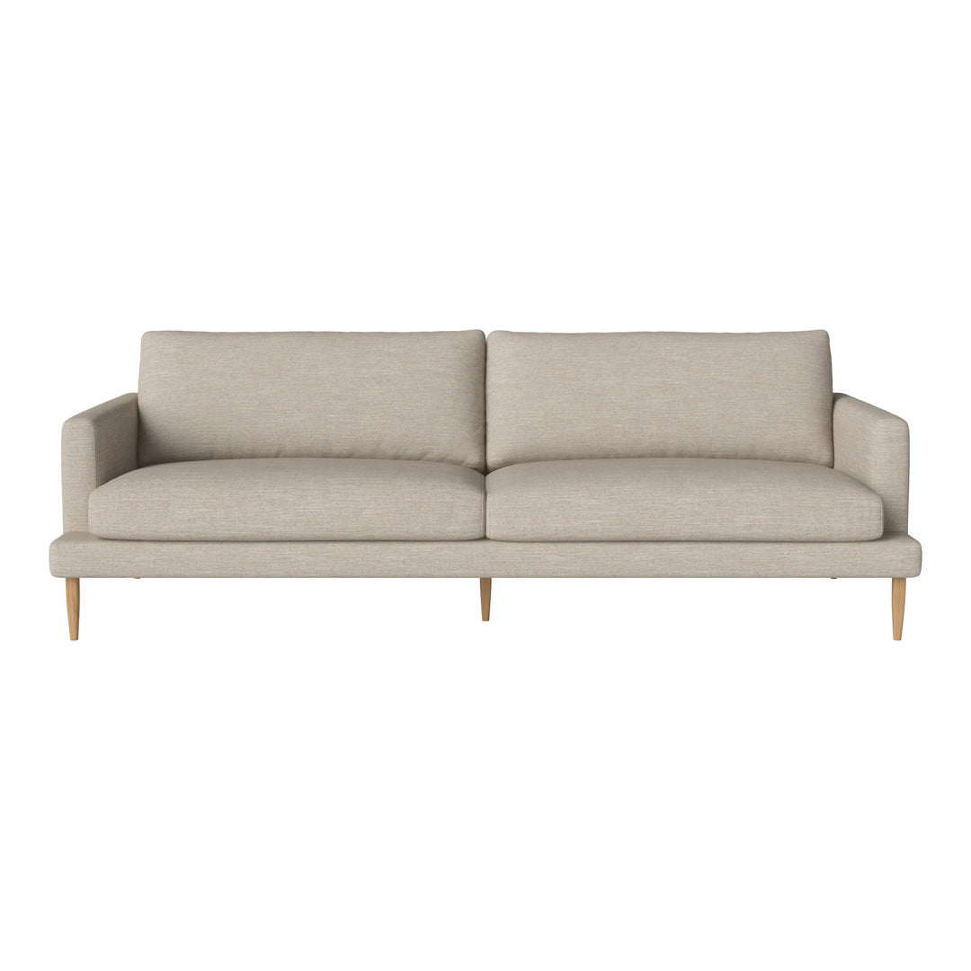 Light beige sofa with a minimalist design and natural wood legs, featuring a textured fabric upholstery.