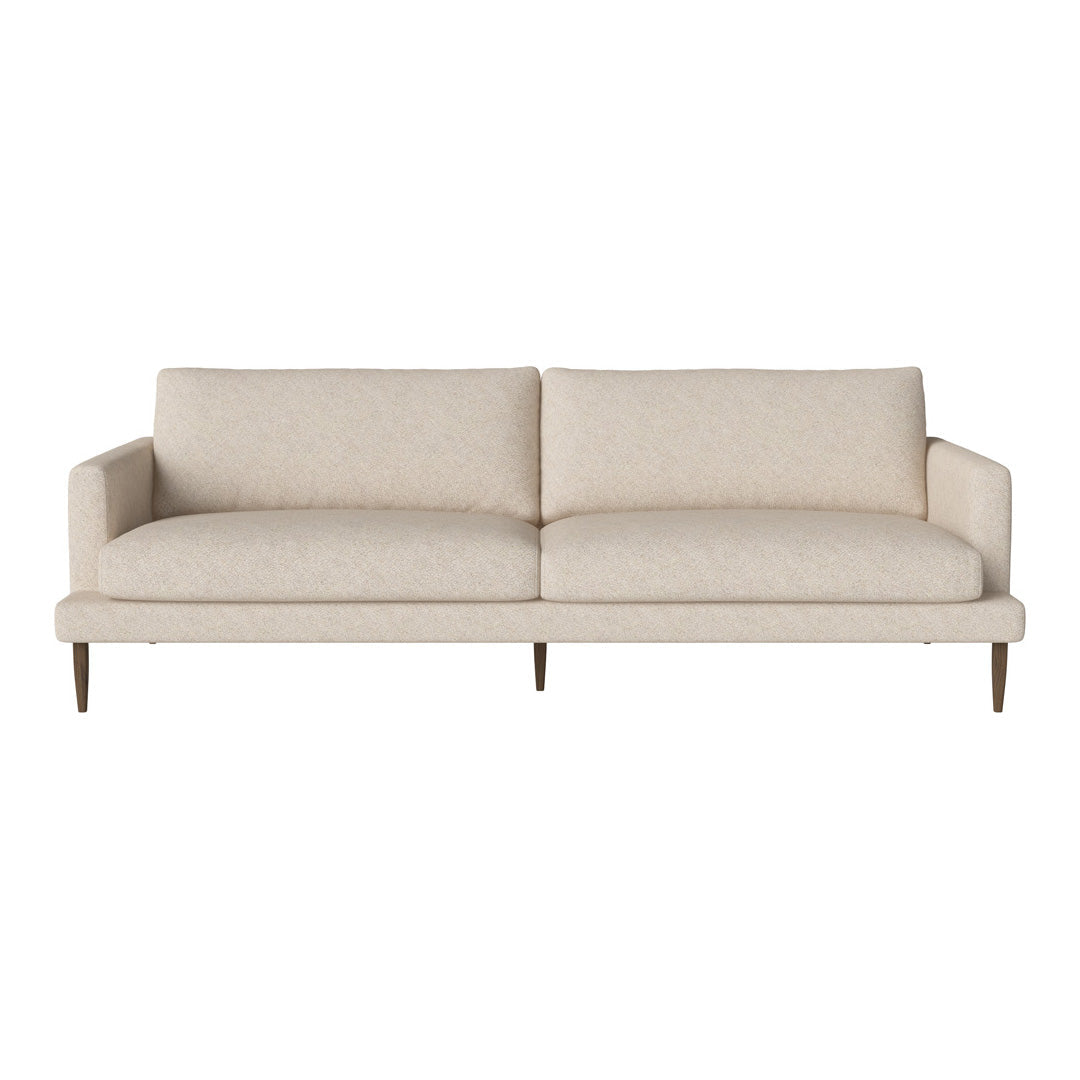 Light beige sofa with a smooth, minimalist design and subtle texture. Perfect for modern living spaces.