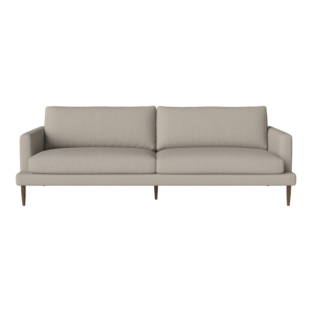 Light beige sofa with a simple, clean design and smooth upholstery; modern style with wooden legs.