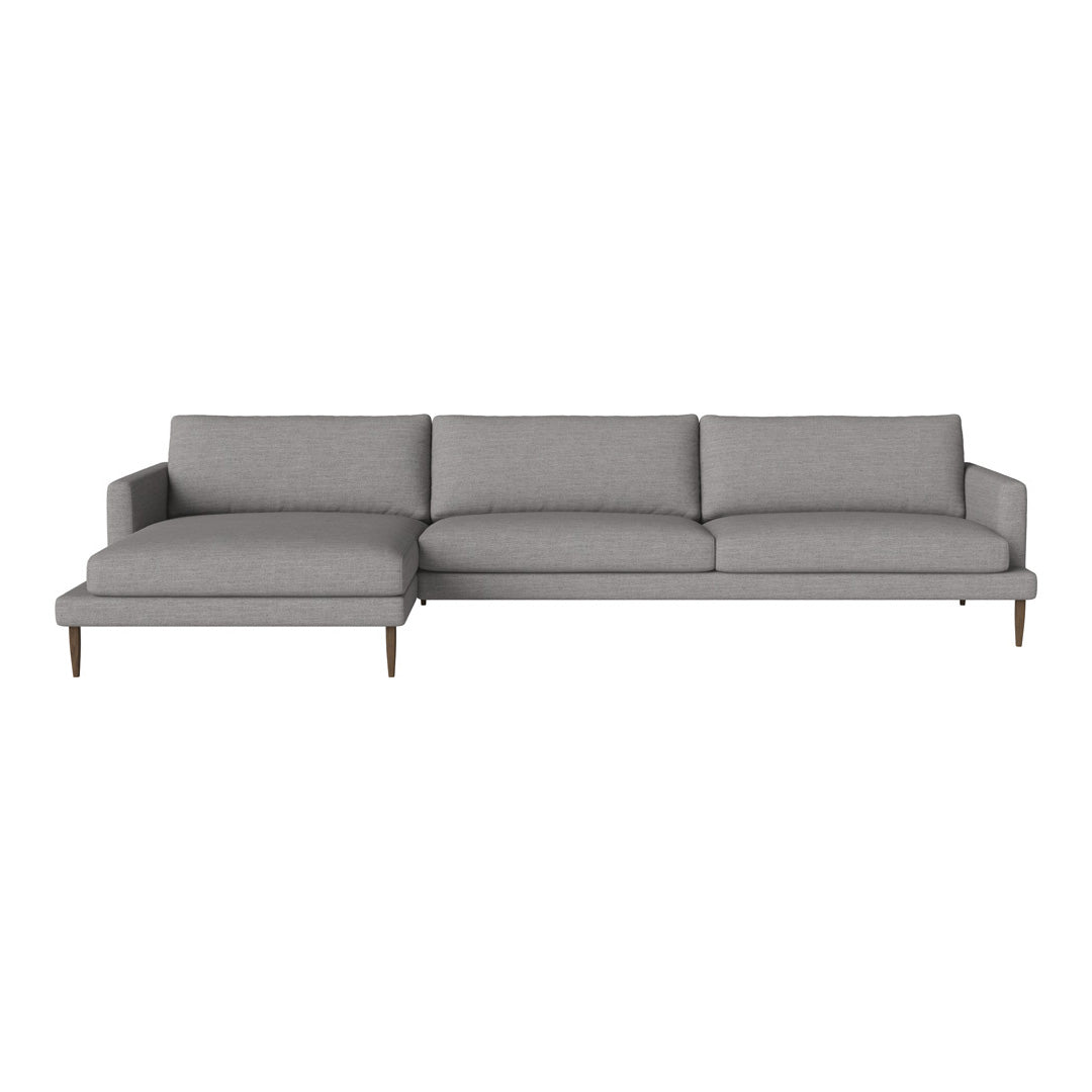 Gray fabric sectional sofa with clean lines and minimalist design, featuring solid wood legs for a modern touch.