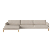 Light beige sectional sofa with a smooth fabric texture and natural wooden legs, perfect for modern living spaces.