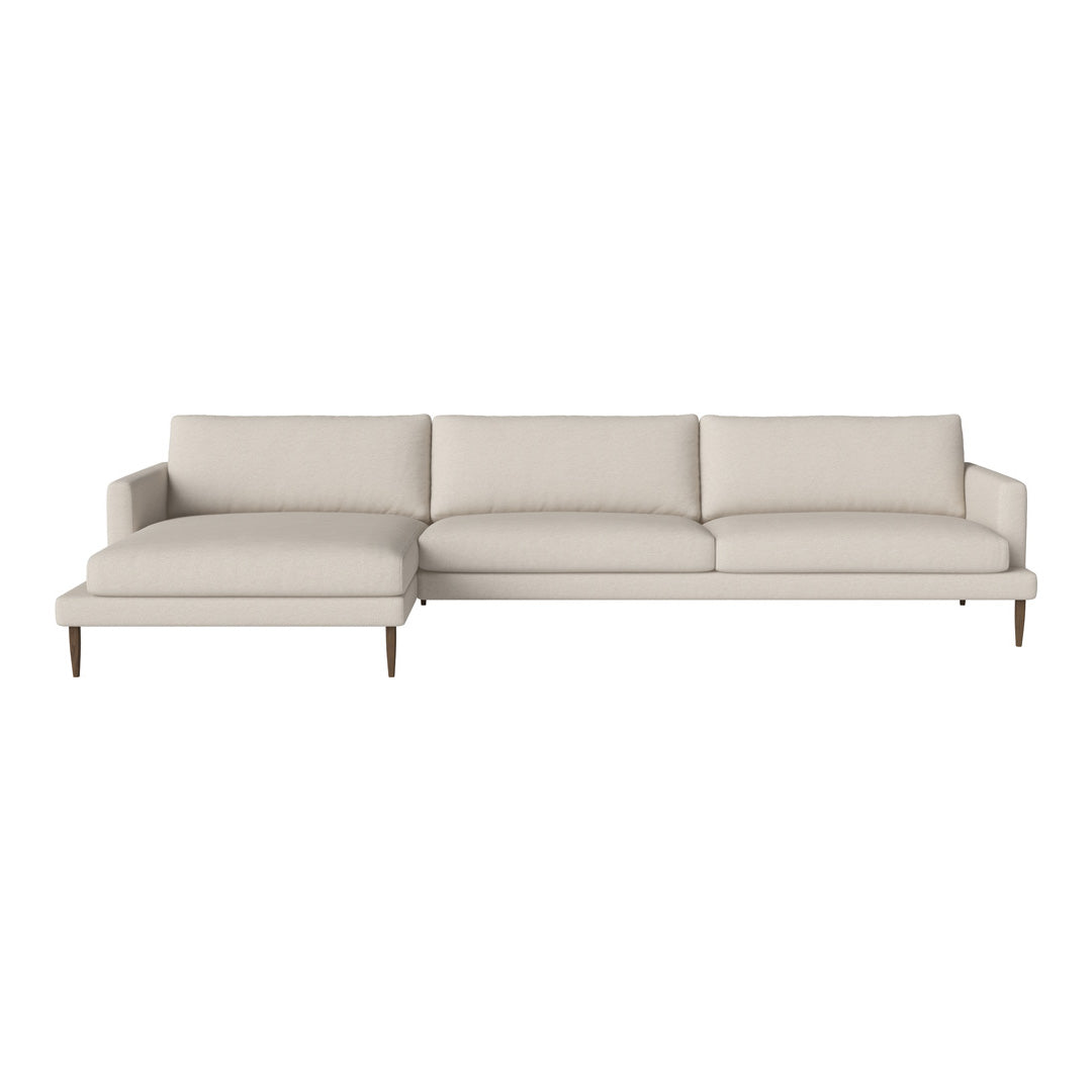 Light beige sectional sofa with smooth upholstery and minimalist design, featuring straight lines and no patterns.