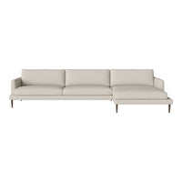 Light beige fabric sectional sofa with a minimalist design and smooth, clean lines. Ideal for modern living spaces.