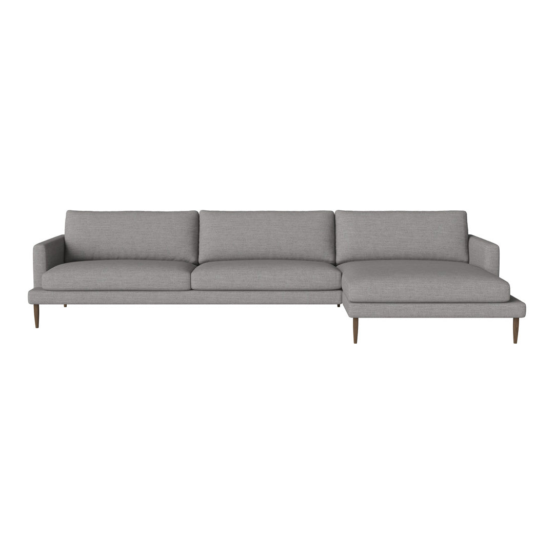 Gray sofa with a sleek modern design, featuring clean lines and subtle texture, perfect for contemporary decor.