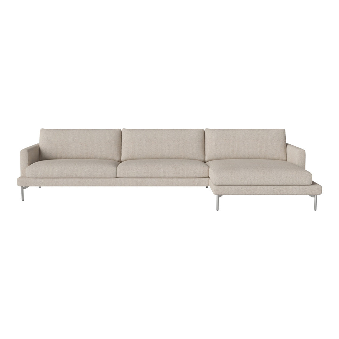 Beige sectional sofa with clean lines and smooth upholstery, featuring a minimalist design and silver legs.