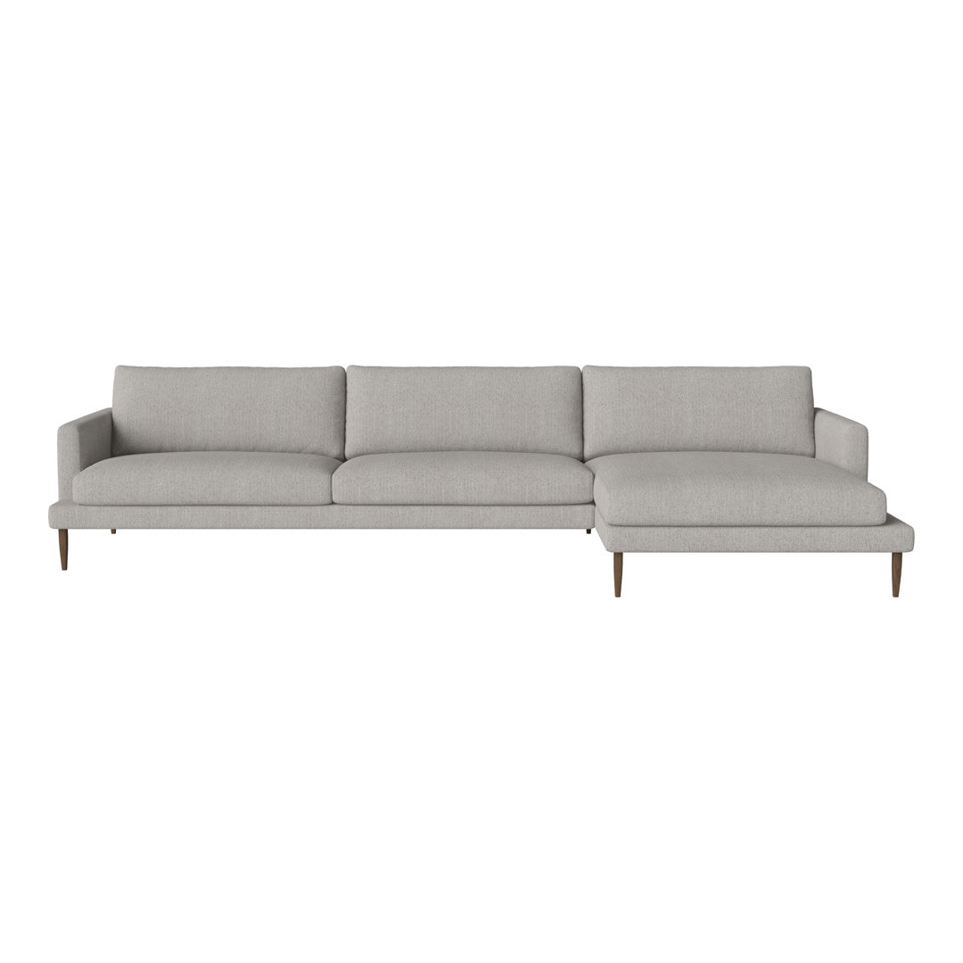 Light gray sectional sofa with a clean, modern design and subtle textured pattern on the fabric.