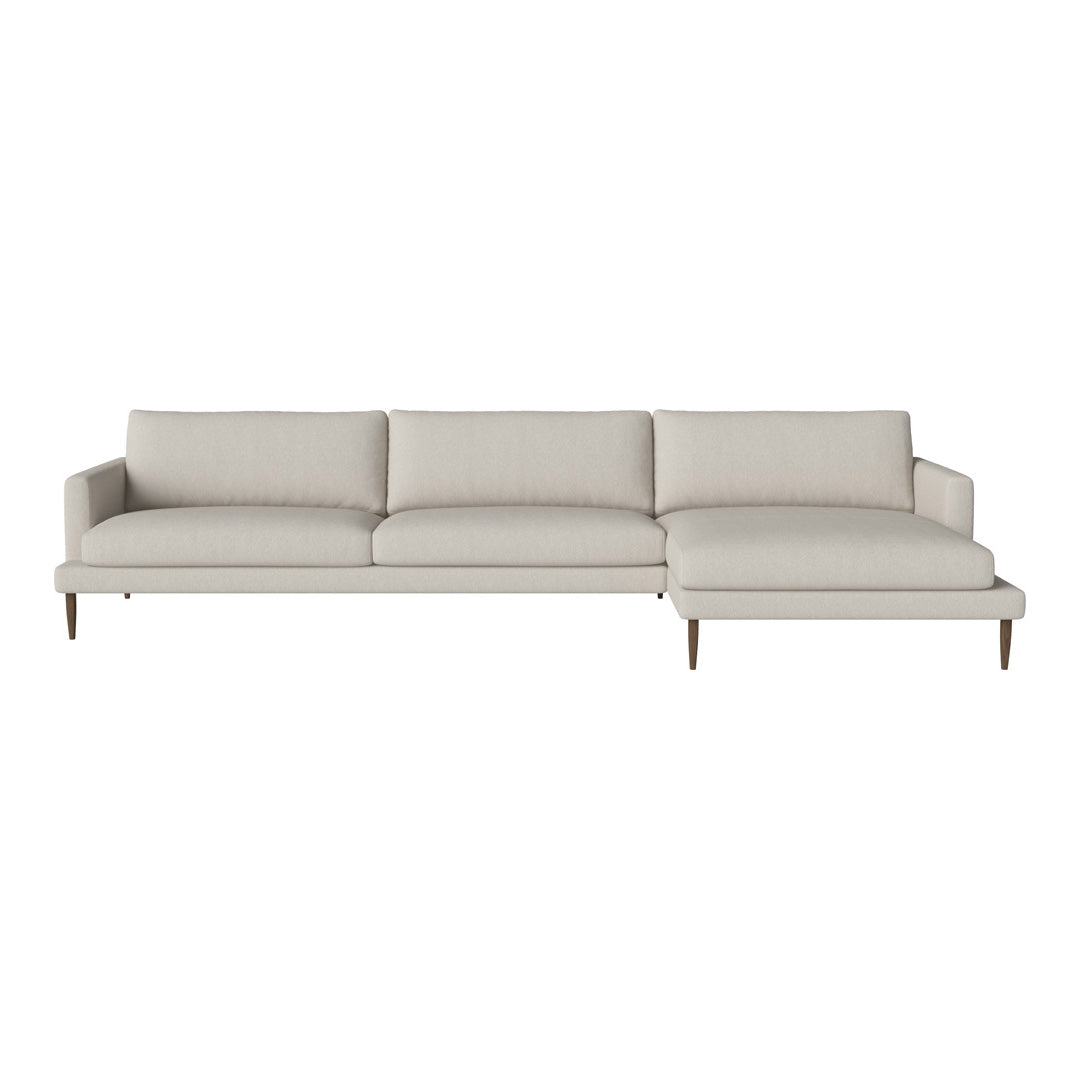Light gray sectional sofa with smooth fabric texture and minimalist design, featuring soft, neutral tones and clean lines.