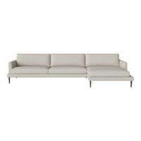 Light gray sectional sofa with smooth fabric texture and minimalist design, featuring soft, neutral tones and clean lines.