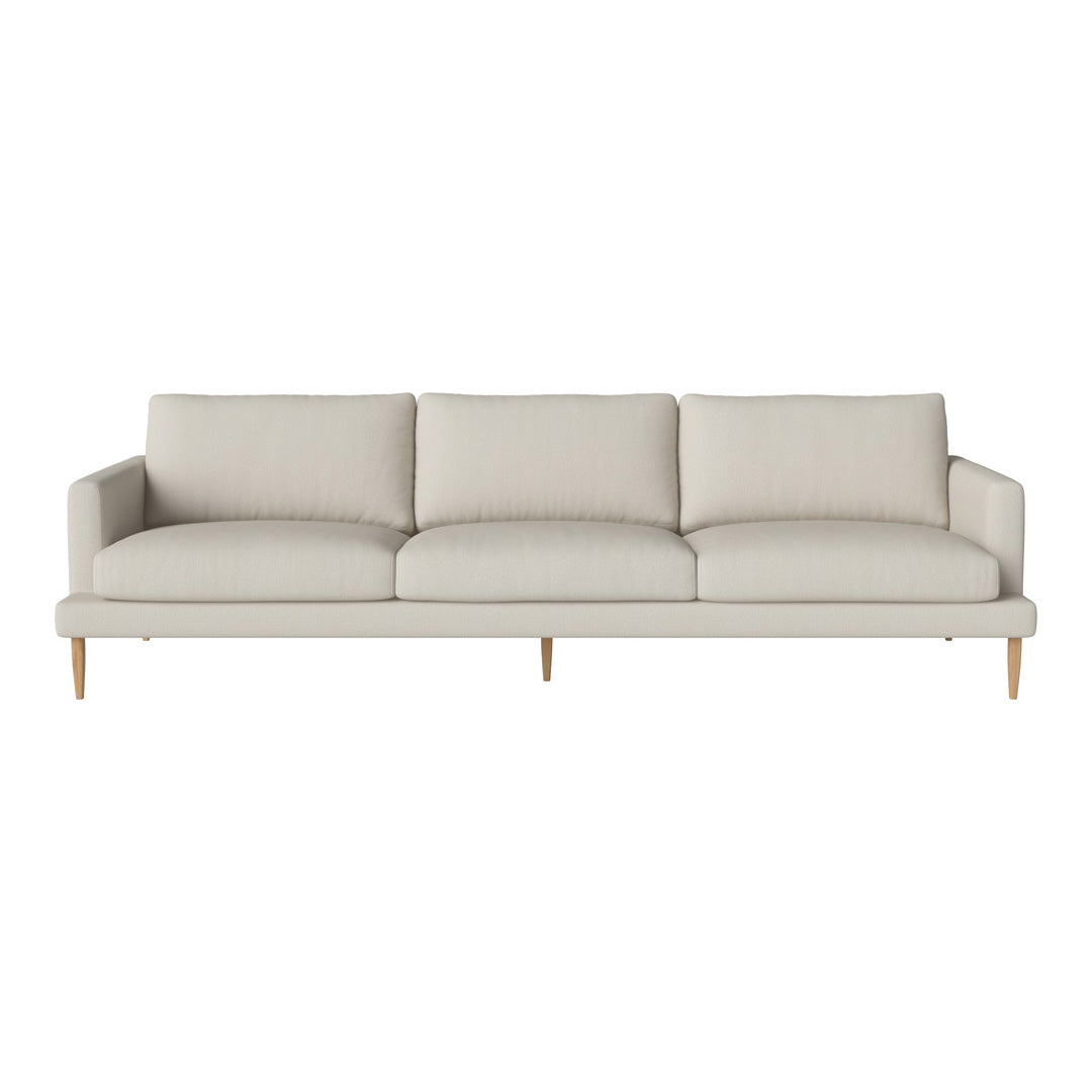 Light beige sofa with a smooth texture and minimalist design, featuring three plush cushions and natural wood legs.