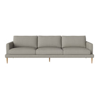 Light gray fabric sofa with a clean, modern design and smooth, minimalist lines. Natural wood legs for added warmth.