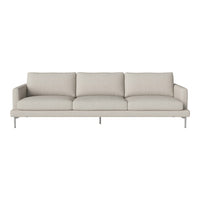 Modern beige sofa with a minimalist design, featuring solid cushions and sleek silver legs. Perfect for any decor.