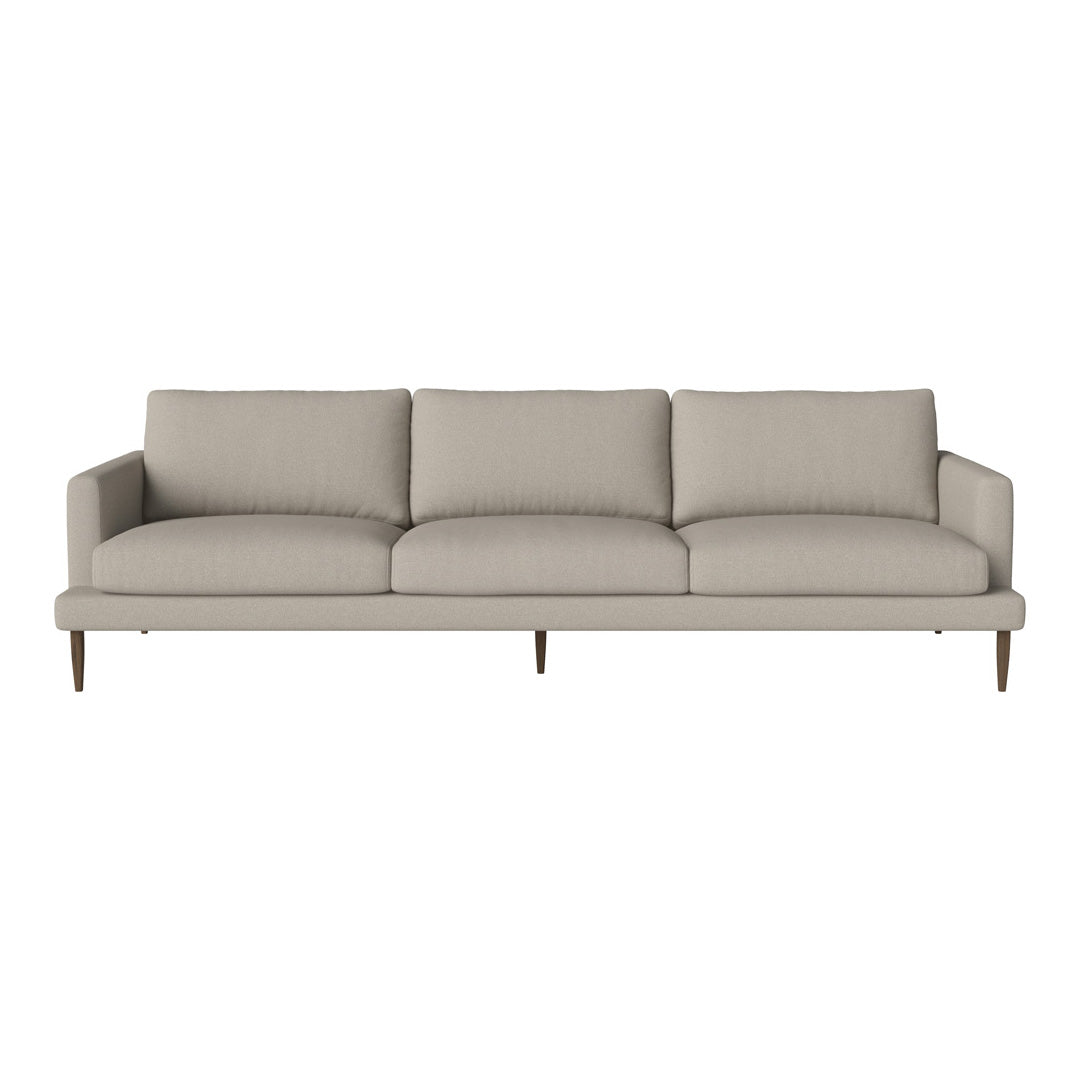 Light beige sofa with a simple, clean design and soft fabric, featuring three plush cushions and minimalist wooden legs.