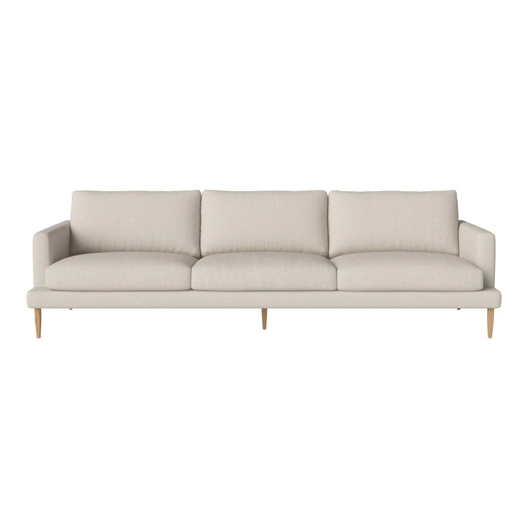 Beige fabric sofa with clean lines, three spacious cushions, and light wooden legs for a minimalist look.