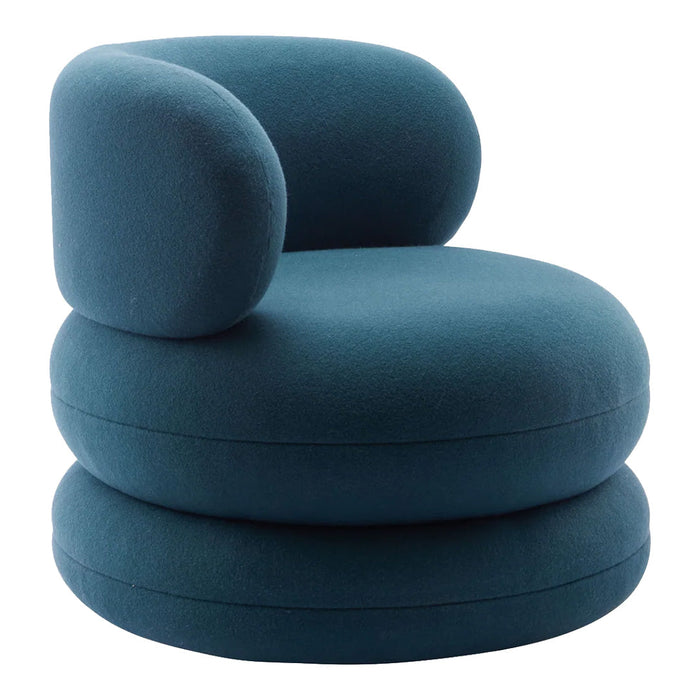 Teal circular chair with a modern, soft texture, featuring rounded armrests and layered cushions. Perfect for contemporary decor.