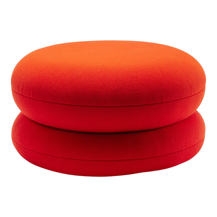 Bright red round cushions stacked together, featuring a smooth texture and bold color for vibrant décor.