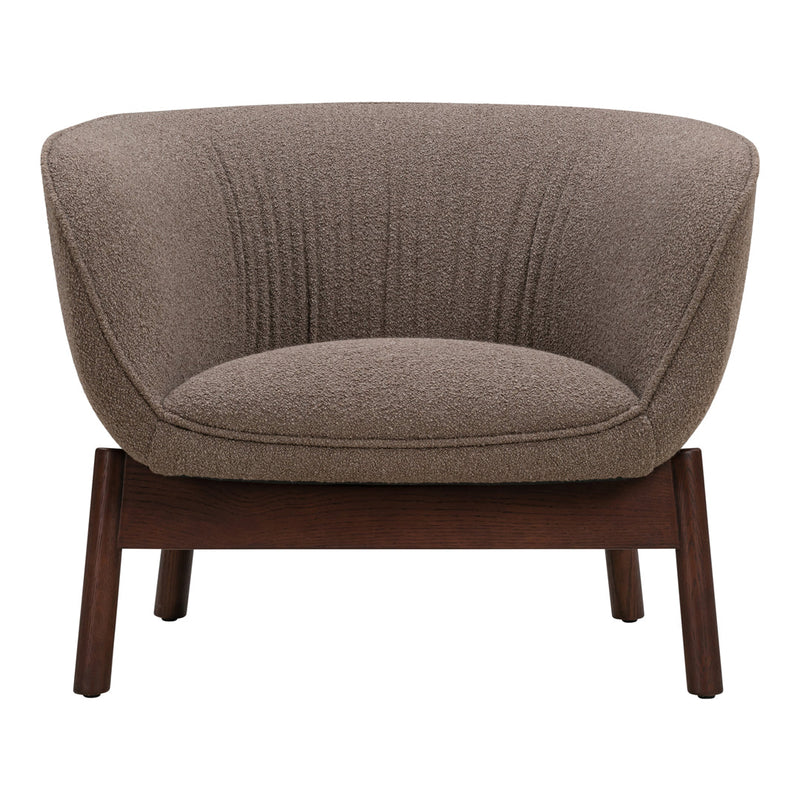 Brown upholstered armchair with ribbed texture and dark wooden legs, perfect for modern living spaces.