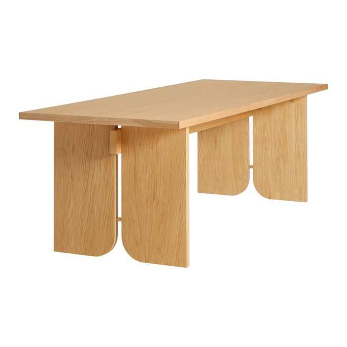 Light oak rectangular dining table with smooth wood grain and natural finish. Modern design features curved legs.