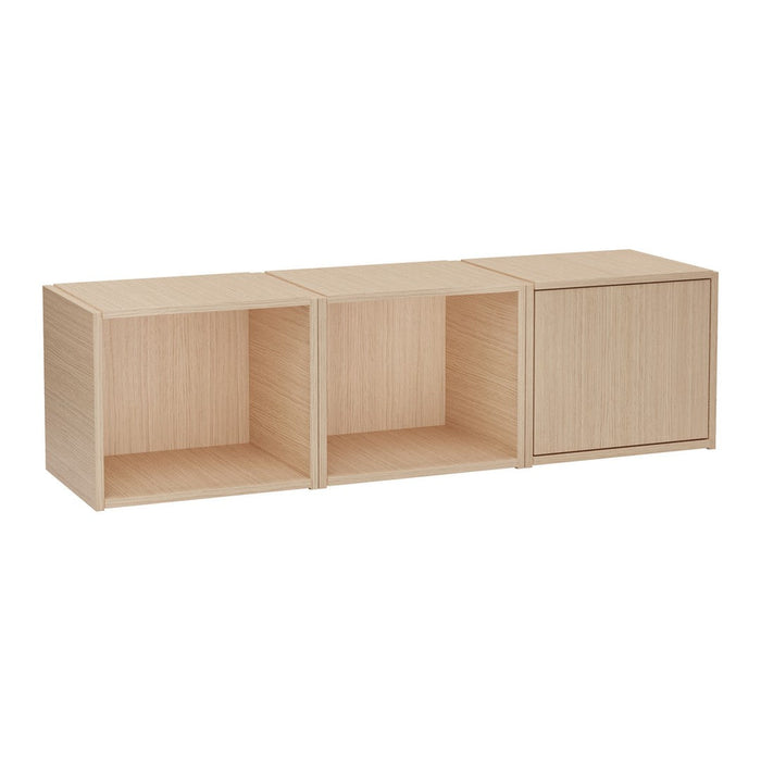 Light oak storage unit with a natural wood grain pattern, featuring three cubed compartments.