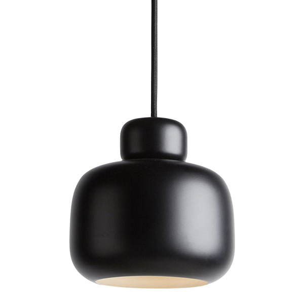 Matte black pendant light with a smooth, rounded design and a soft interior glow. Ideal for modern decor.
