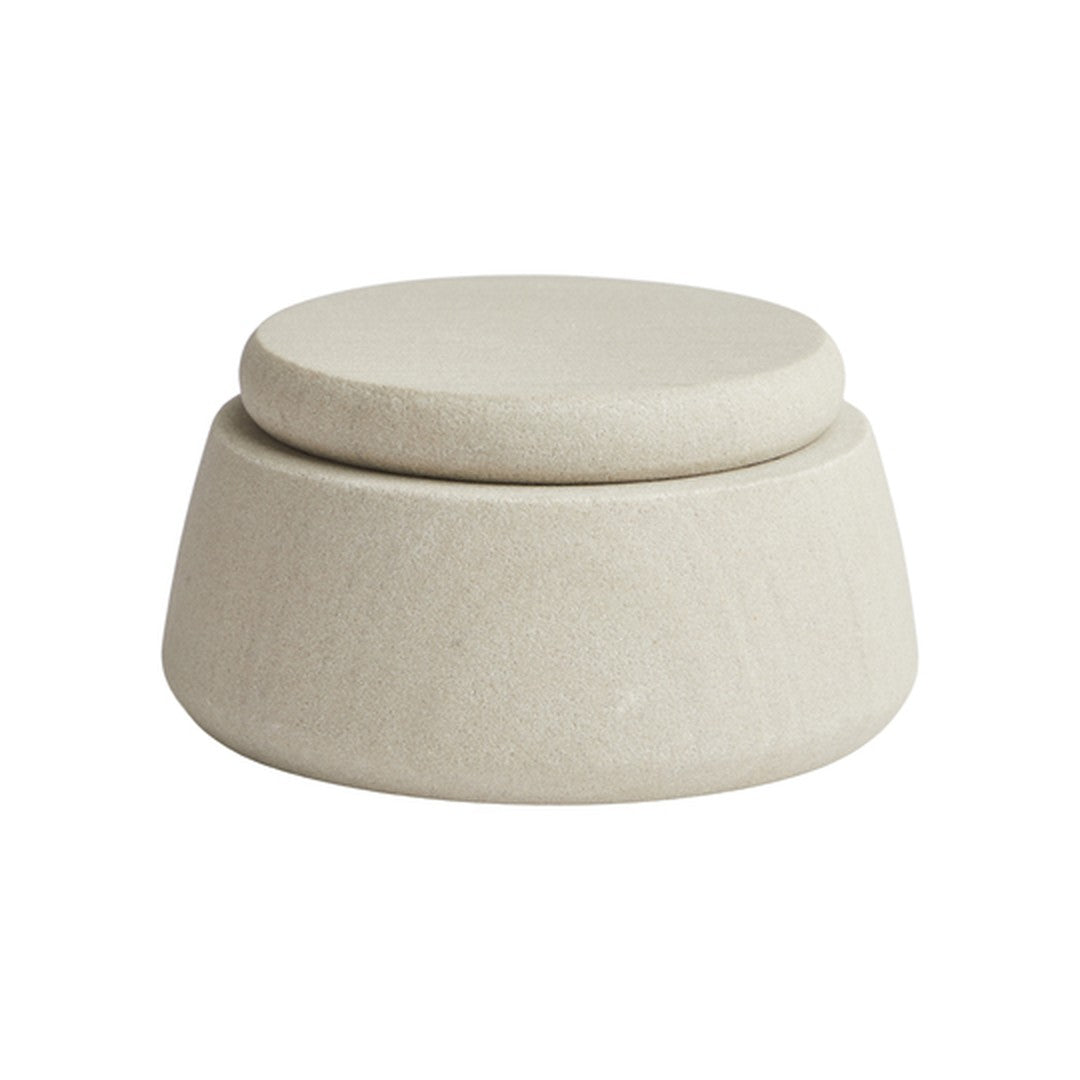 Beige stoneware container with a smooth, matte finish and modern, minimalist design. Ideal for home decor.