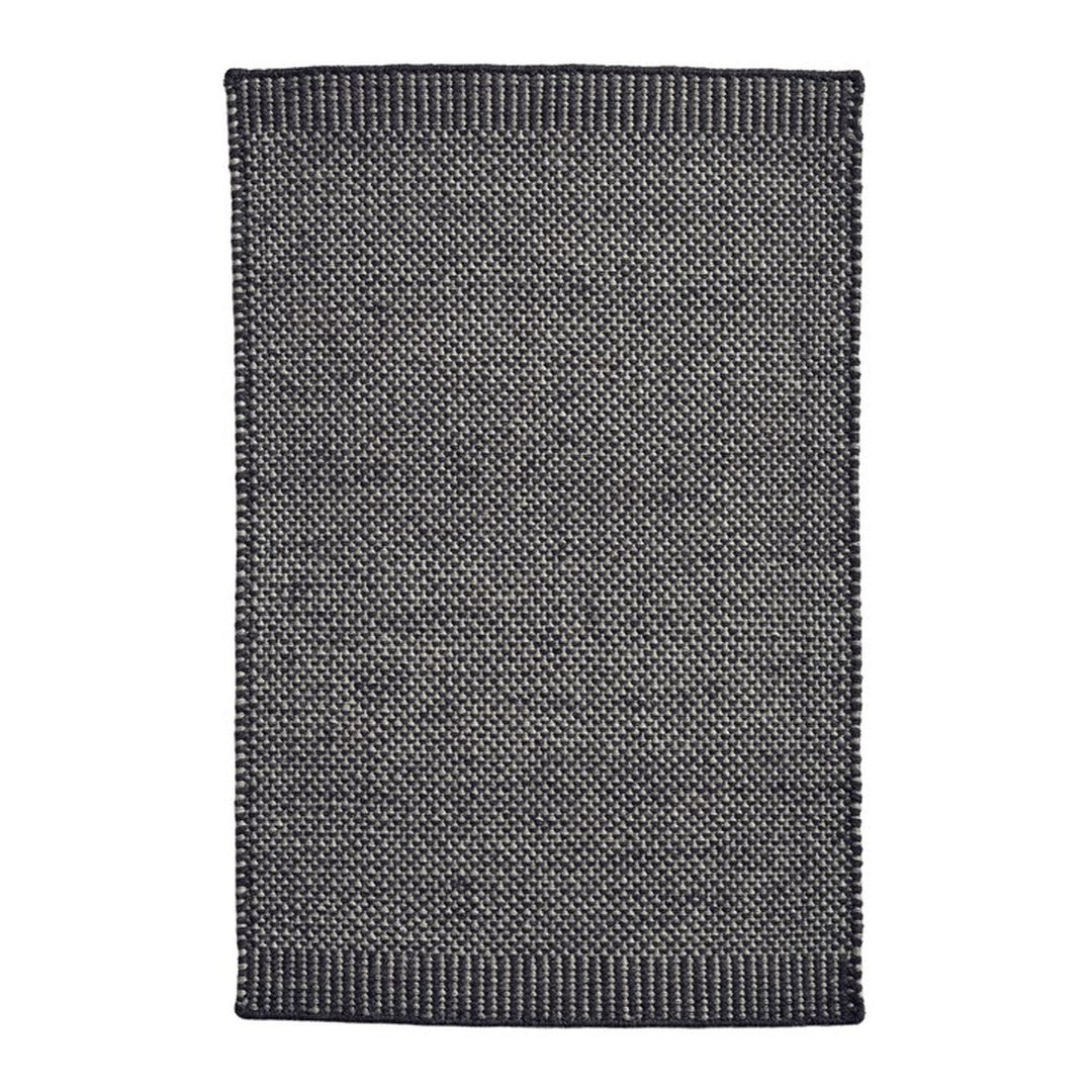 "Textured gray rug featuring a subtle woven pattern and contrasting dark border, ideal for modern decor."