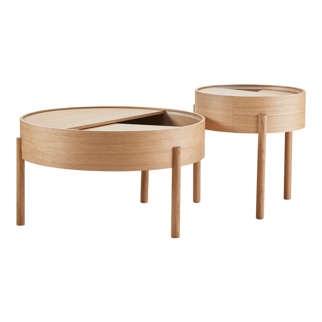 Light wood round coffee tables with contrasting natural and smooth finishes and minimalist design.