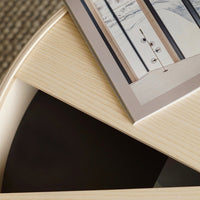 Light wood with a smooth finish, featuring soft beige tones and subtle texture patterns. Black accent provides contrast.