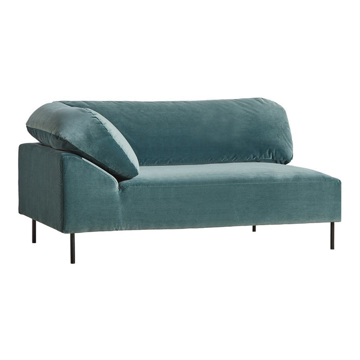 Teal velvet sofa with a modern design and minimalistic pattern, featuring clean lines and a unique asymmetric cushion.