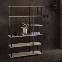 Modern black metal and natural wood bookshelf with clean lines, showcasing warm tones and minimalist design.