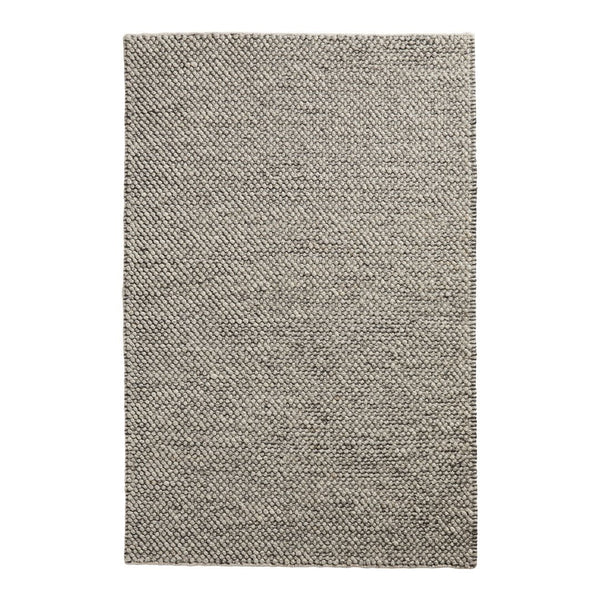 Textured gray and beige woven rug featuring a subtle herringbone pattern for a modern and cozy look.
