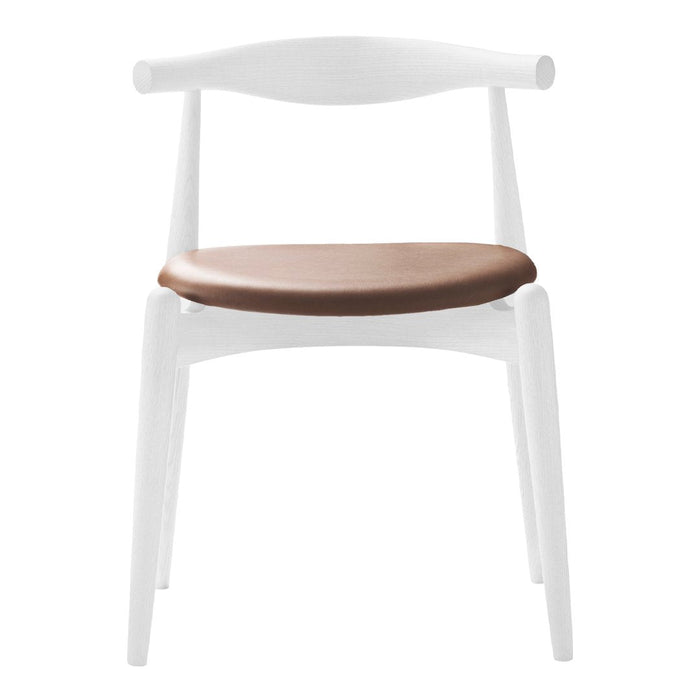 White chair with a smooth brown seat, featuring a minimalist design and elegant curves. Perfect for modern decor.
