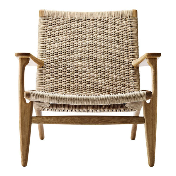 Beige woven chair with natural wood accents, featuring a minimalist design and textured fabric. Perfect for modern decor.