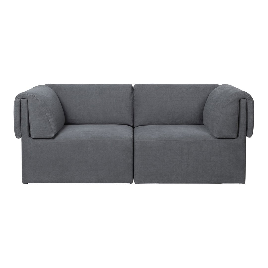 Gray sofa with clean lines and soft, textured fabric, featuring a solid, minimalist design. Perfect for modern decor.