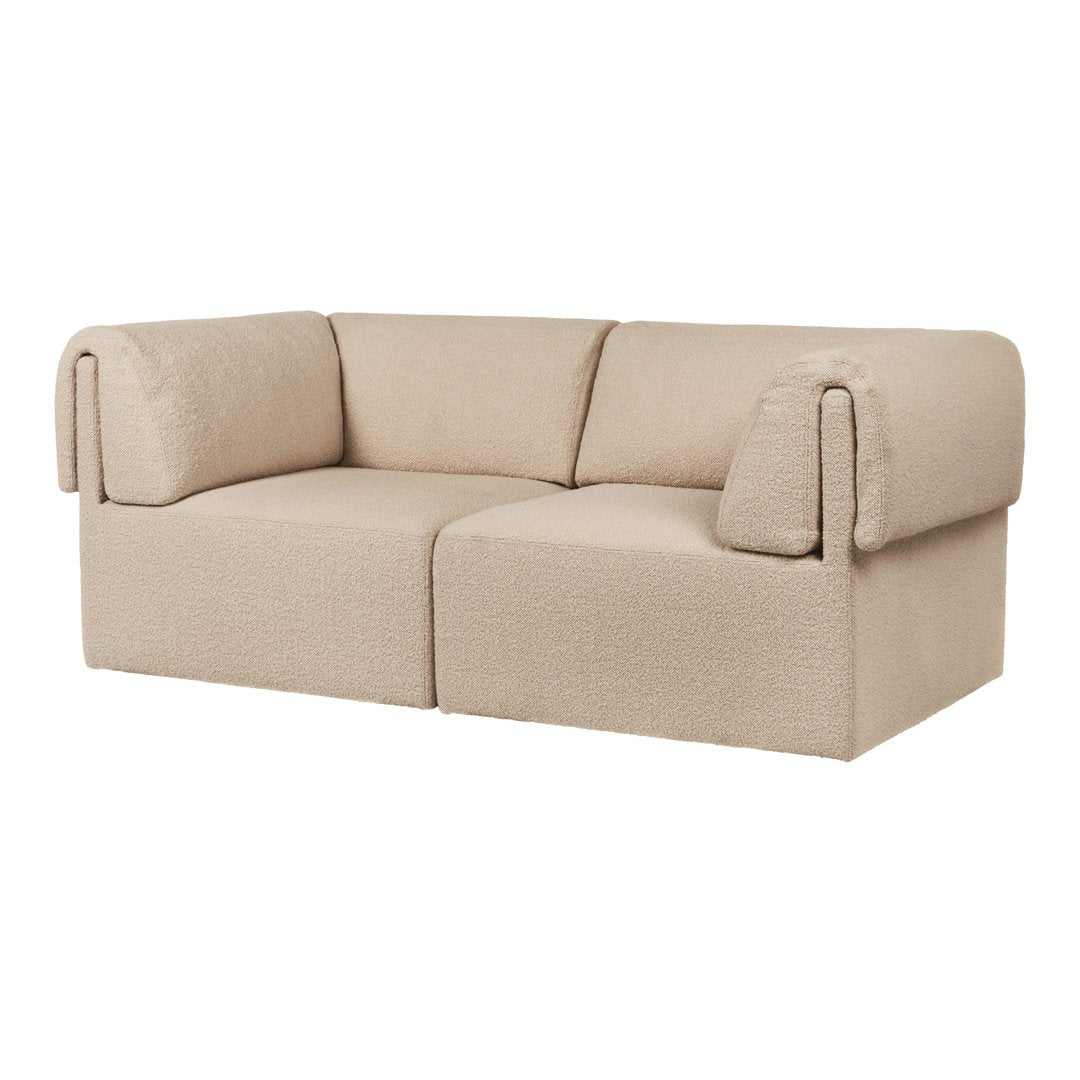 Beige two-seater couch with a soft, textured fabric and minimalist design. Perfect for modern living spaces.