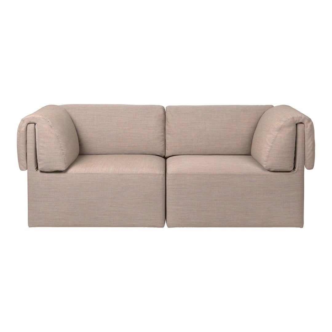 Beige modular sofa with textured fabric and soft rounded armrests, perfect for modern living spaces.