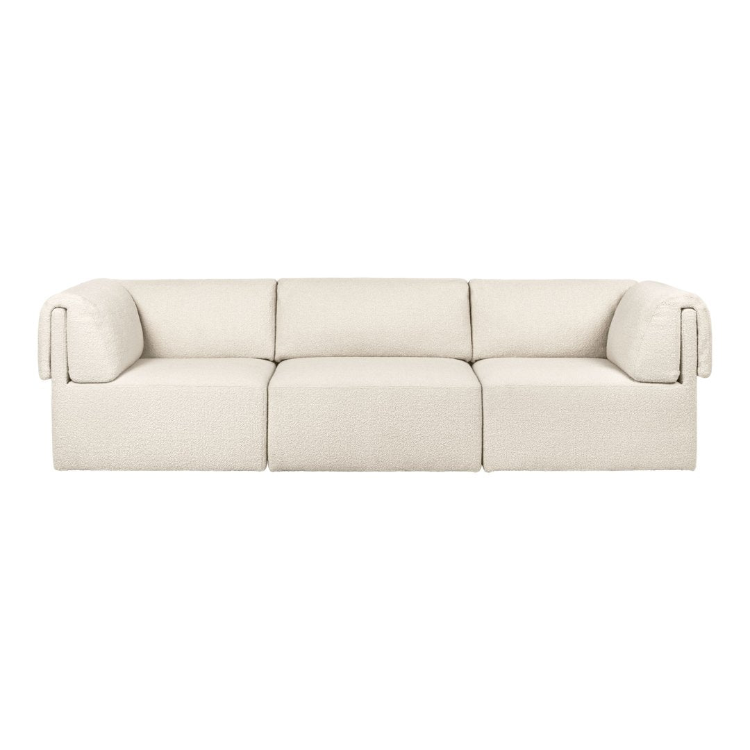 Cream-colored sofa with a smooth, minimalist design and rounded armrests. No patterns. Elegant and modern look.