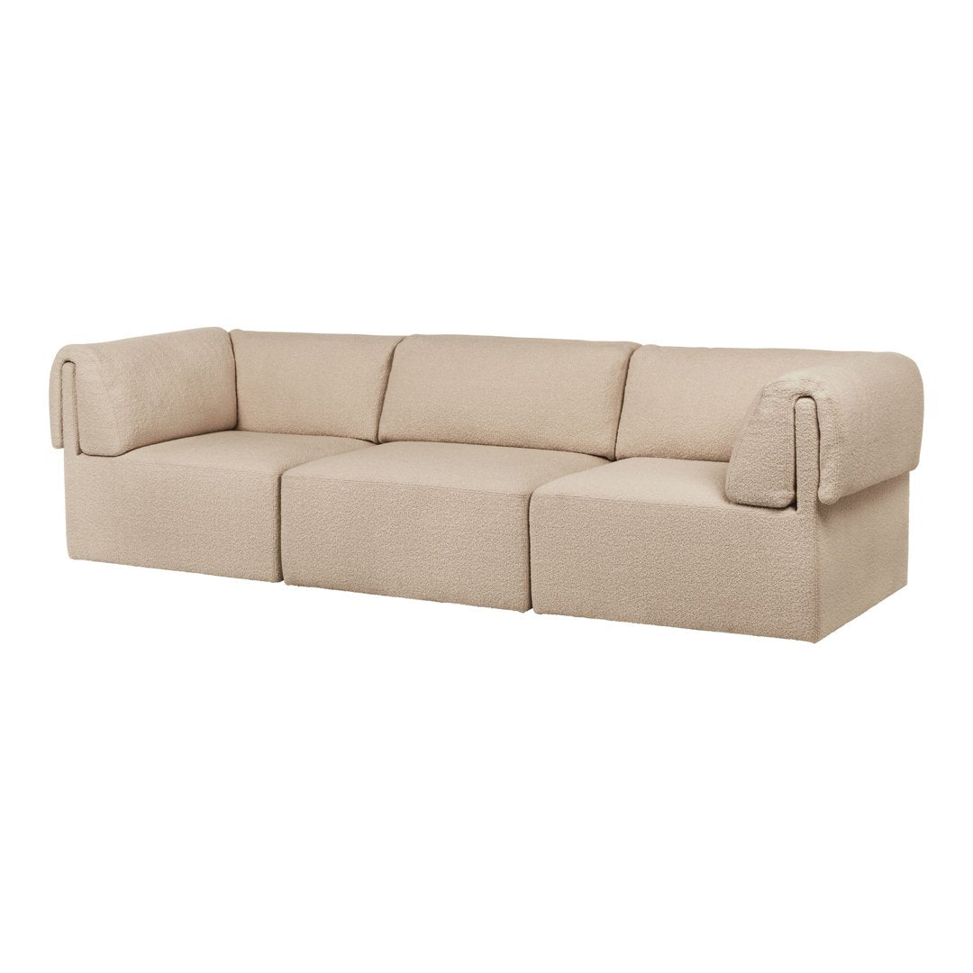 Beige modern sofa with a textured fabric, featuring a minimalist design and clean lines, perfect for contemporary spaces.