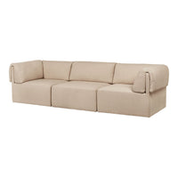 Beige modern sofa with a textured fabric, featuring a minimalist design and clean lines, perfect for contemporary spaces.