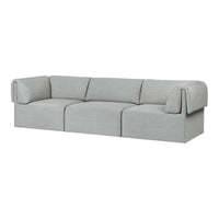 "Light gray sectional sofa with soft fabric and minimalistic design, featuring subtle texture and clean lines."