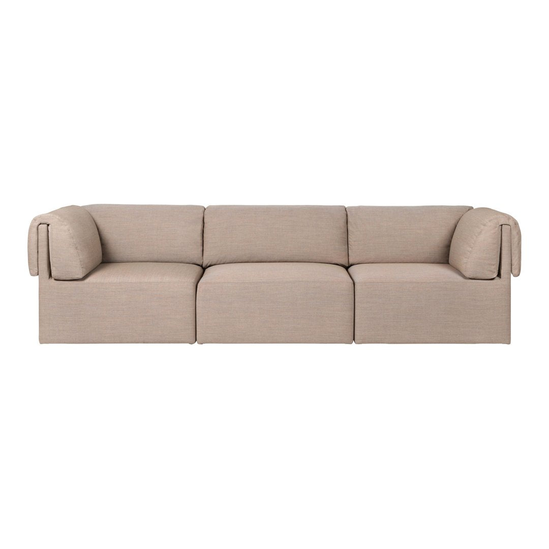 Beige three-seater sofa with soft fabric and subtle texture, featuring rounded armrests for a modern look.